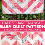 coral and white baby quilt hanging on fence