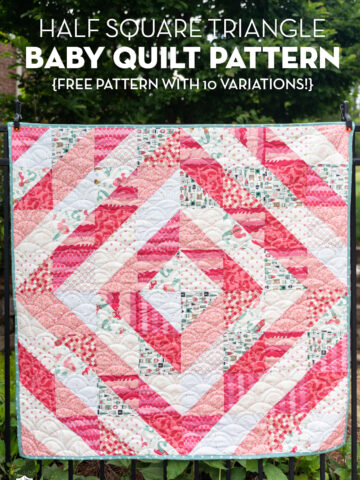 close up of coral and white baby quilt
