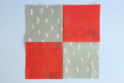 diagram of red and gray quilt block construction