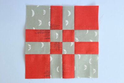 diagram of red and gray quilt block construction