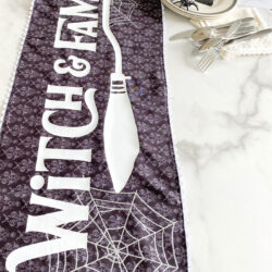 black and white table runner on marble table