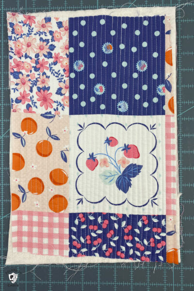 quilted fabric on cutting mat