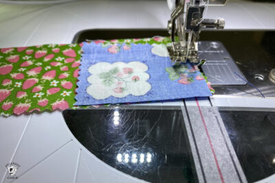 fabric under sewing machine needle