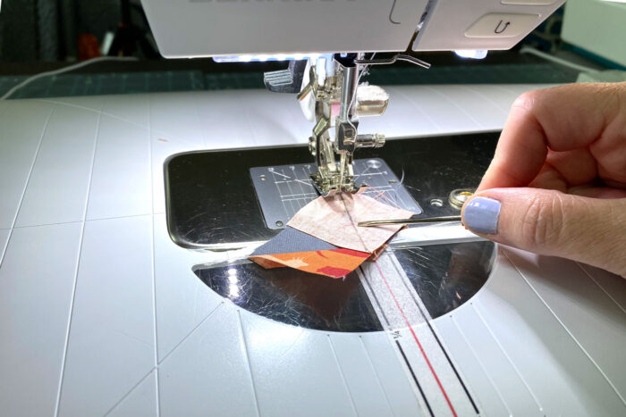 fabric under sewing machine foot