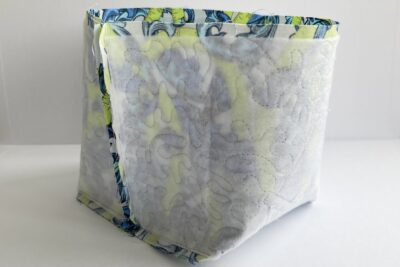 blue fabrics, wrong side out pinned together