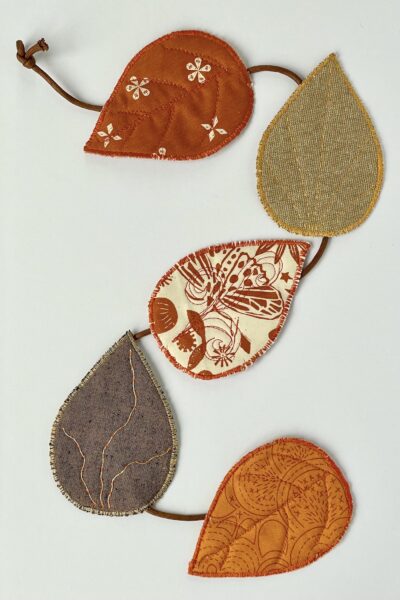 fabric leaves on white tabletop