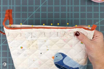 zipper pinned into top of bag