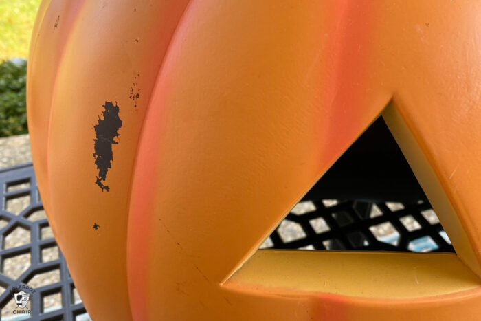 black mark on the side of a foam plastic pumpkin