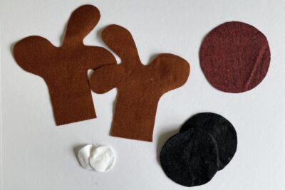 cut pieces of felt on white table