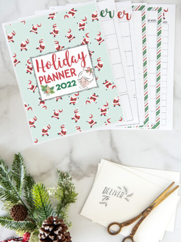 planner pages on white table with christmas decor