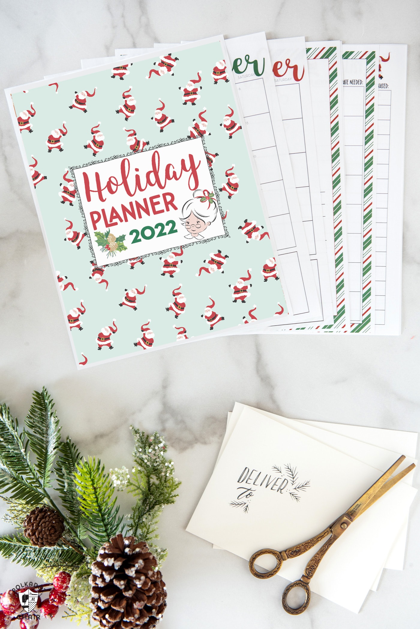planner pages on white table with christmas decor