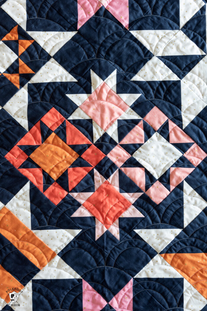 Navy, pink and orange graphic star quilt