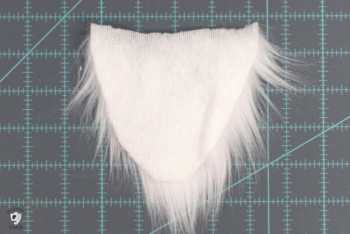 back of faux fur beard on cutting mat