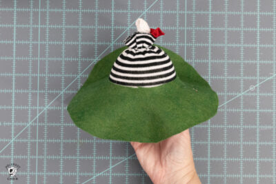 green circle of felt on gnome body