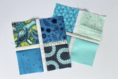 blue fabrics sewn together in patchwork pattern