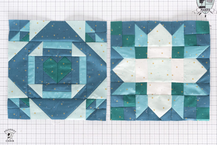 White blue and green quilt block on white cutting mat with folded fabrics