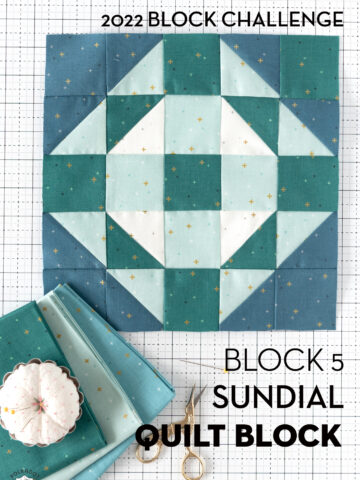blue and white quilt block on white cutting mat