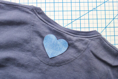 denim heart on back of sweatshirt