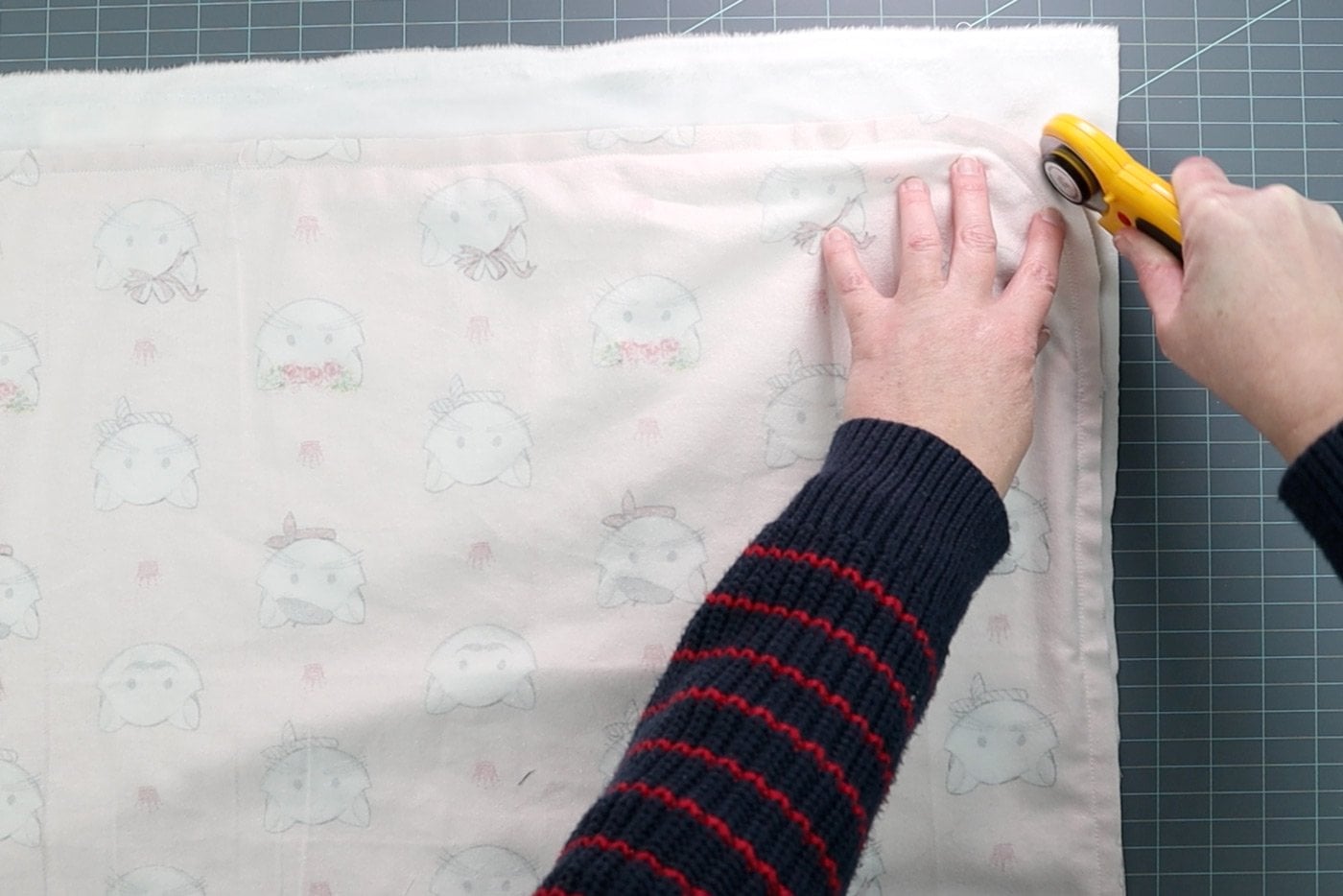 rotary cutter trimming fabric
