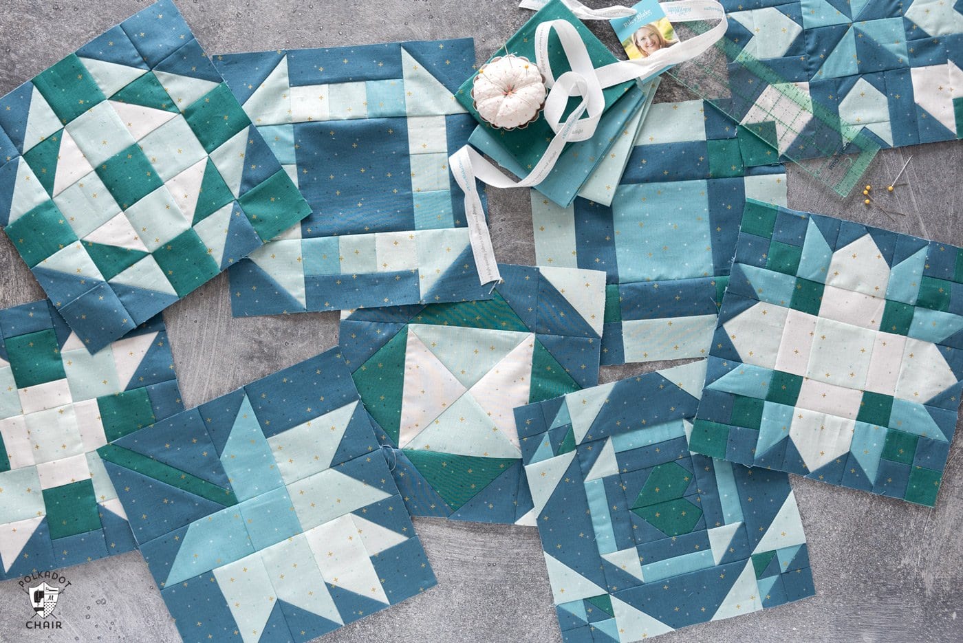 blue and green quilt blocks on gray table