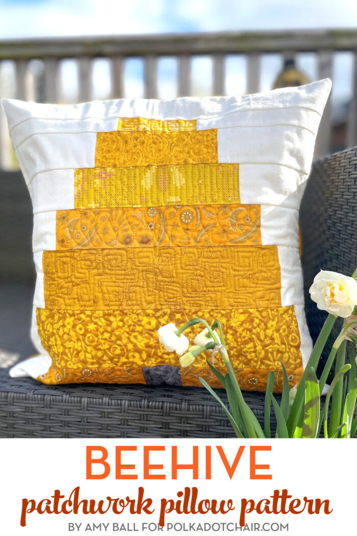 beehive pillow on wicker bench outdoors