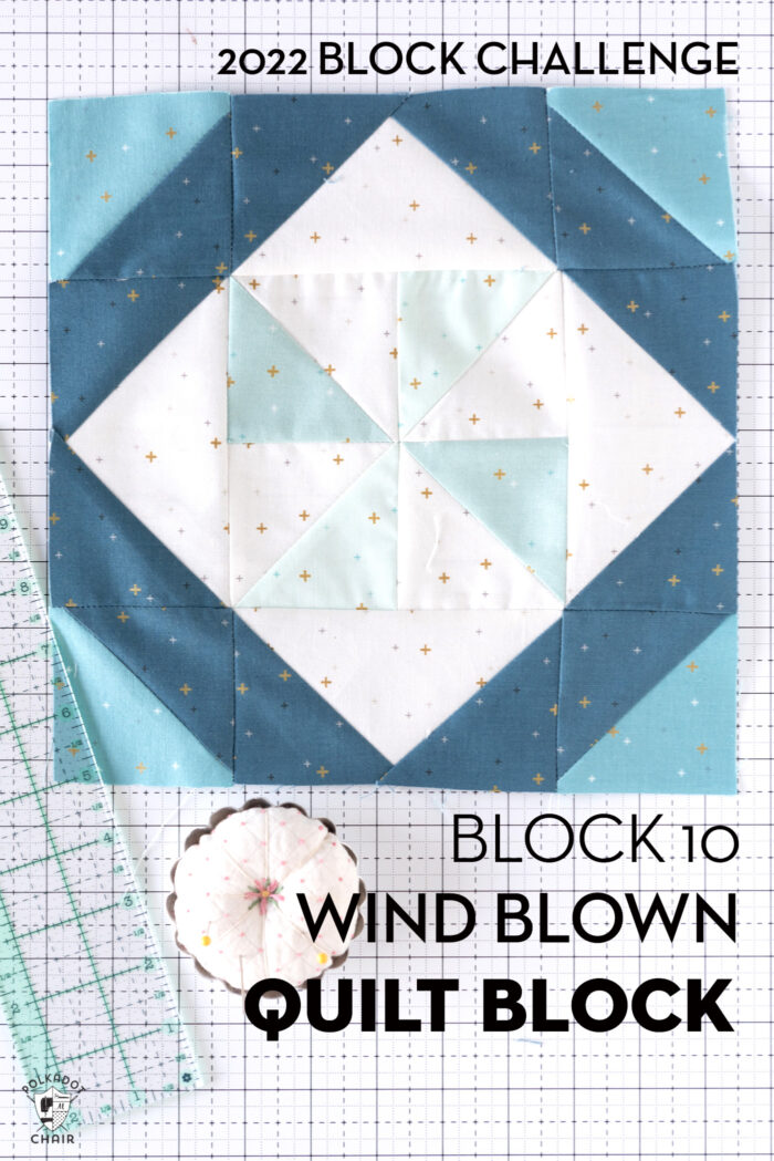Aqua, blue and white quilt block on white cutting mat with ruler