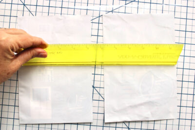 Yellow ruler on white paper