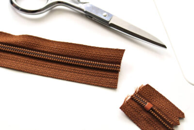 Cut brown zipper