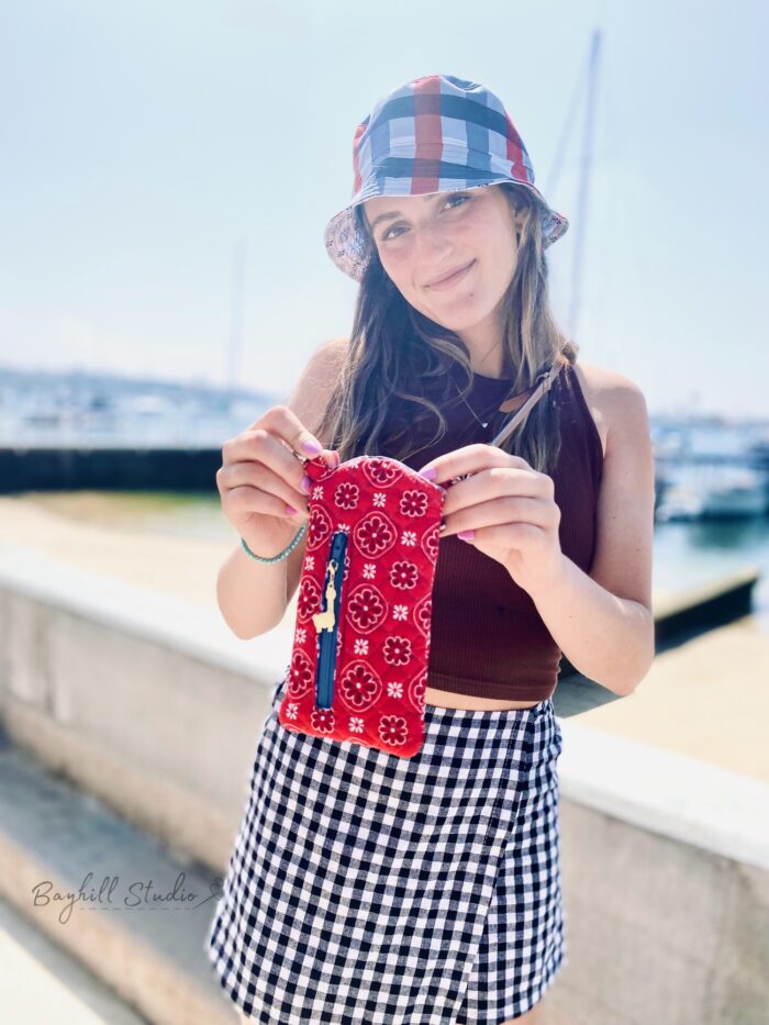 girl holding red purse