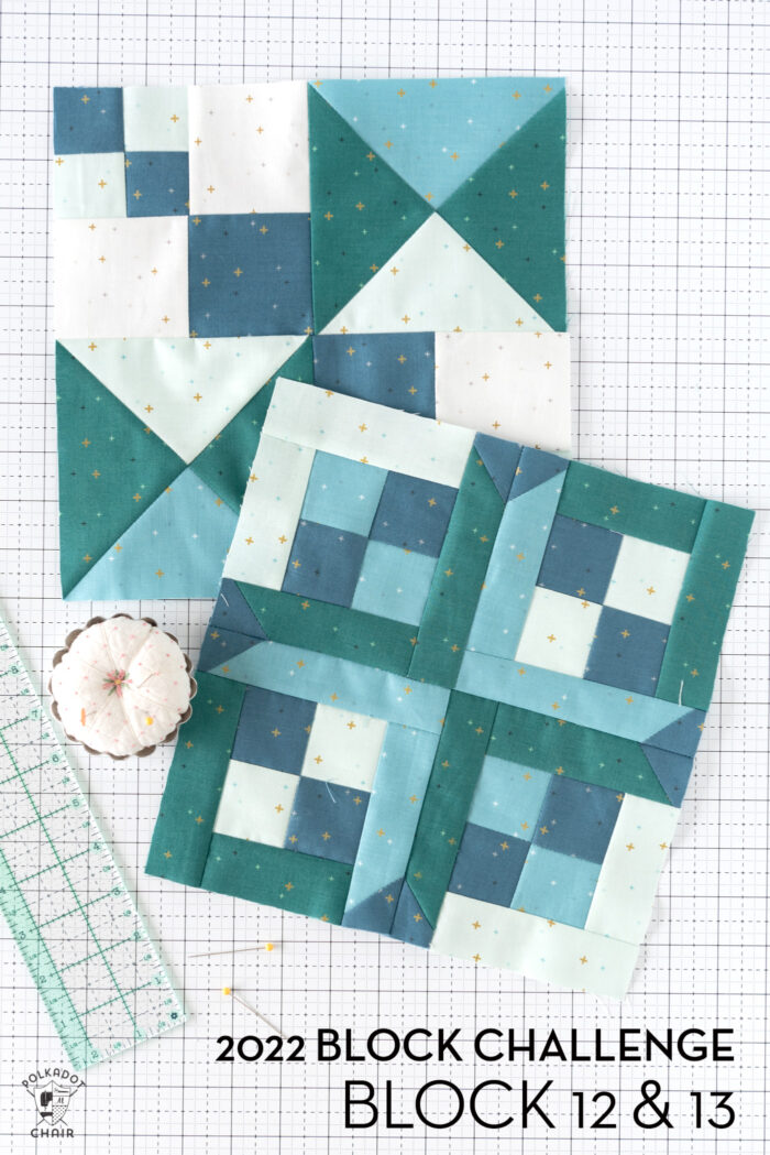 Blue and aqua quilt blocks on white cutting mat with quilting notions