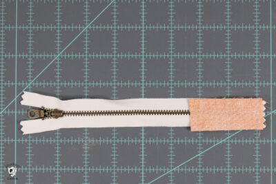 orange fabric on white zipper