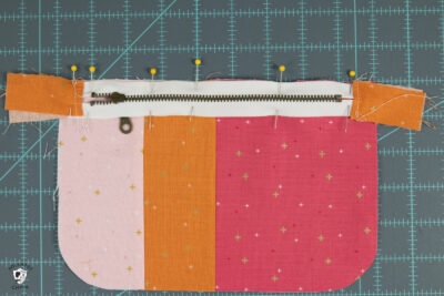 zipper and pink and orange fabric