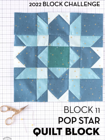 Blue, aqua and white quilt block on white cutting mat with scissors