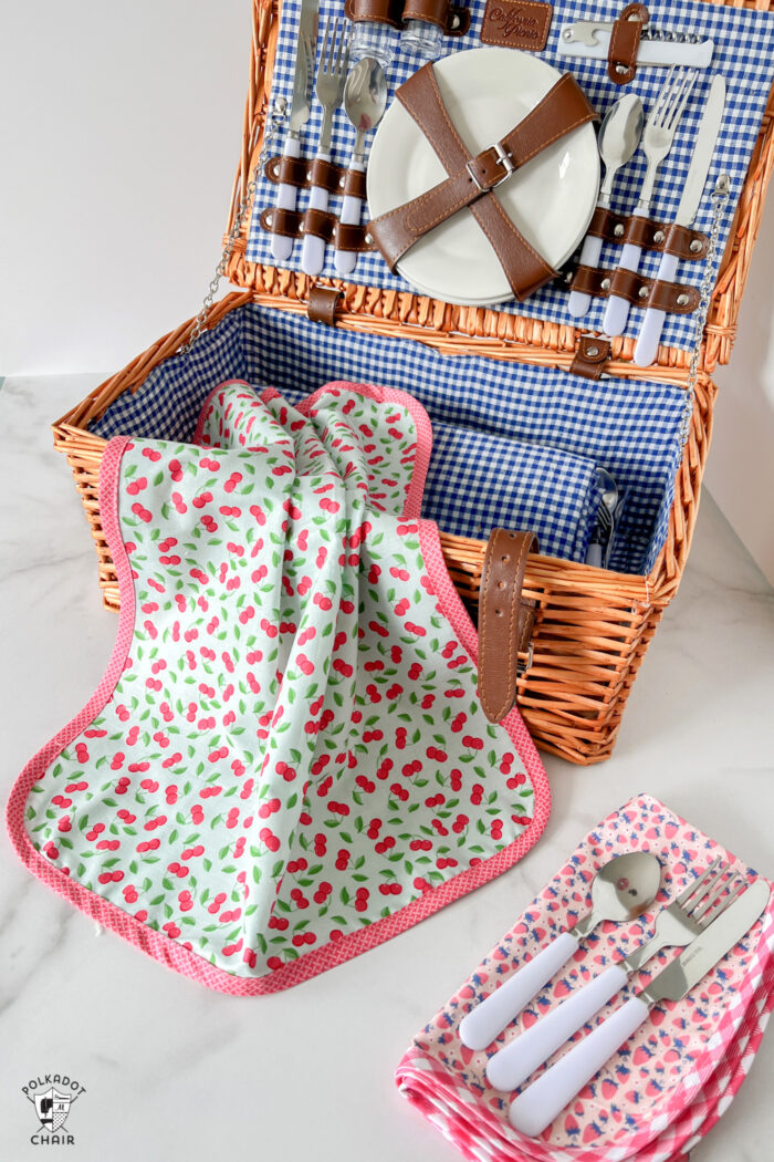 colorful picnic basket on white table