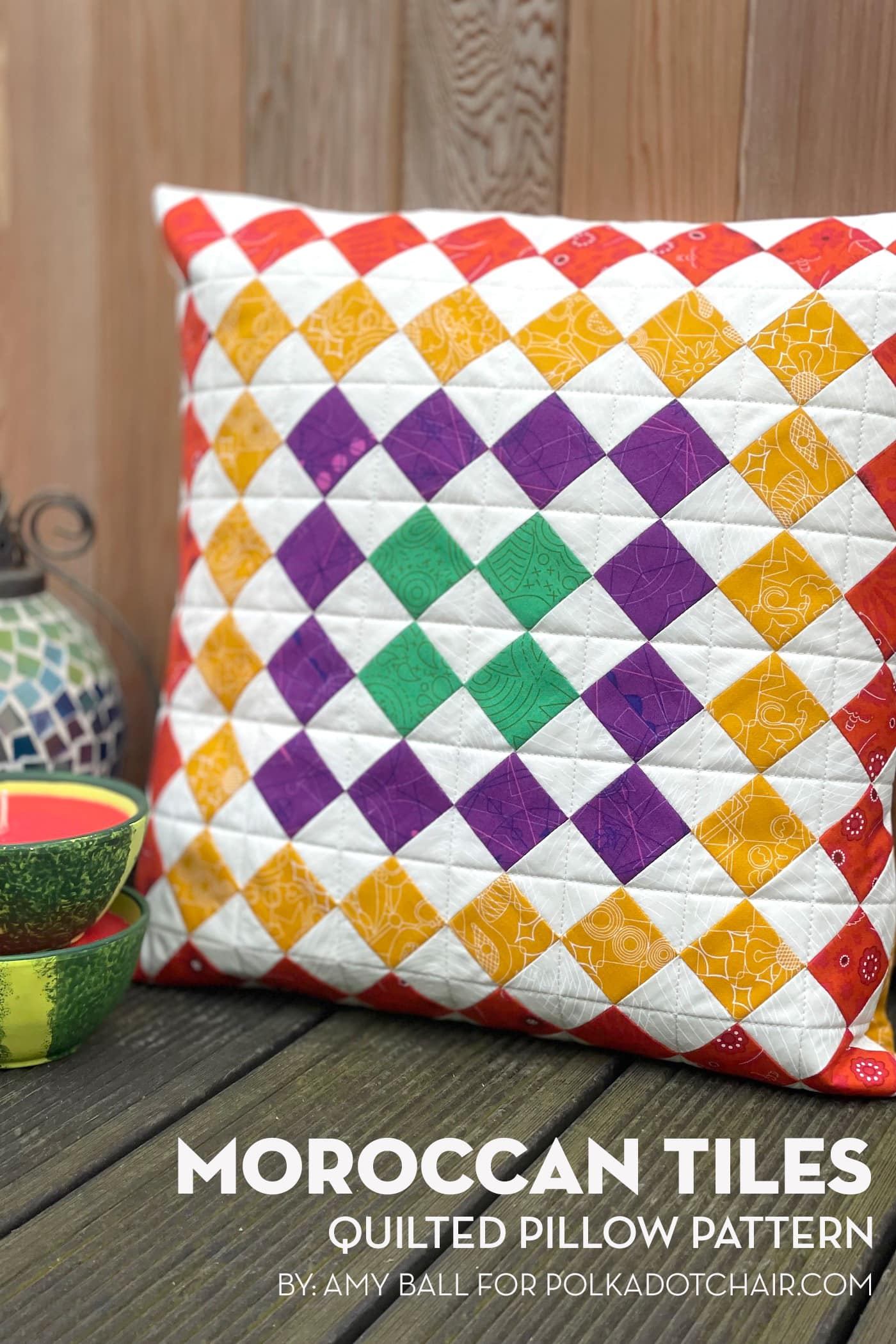 colorful quilted pillow on deck outdoors