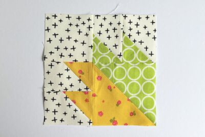 quilt block made from yellow and green fabric