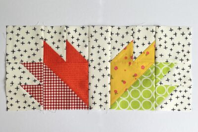 quilt block made from red, yellow and green fabric