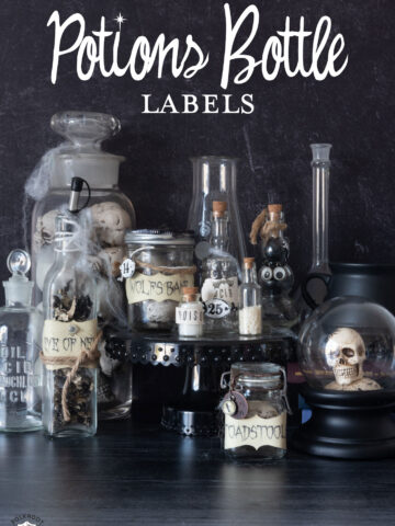glass potions bottles on black table