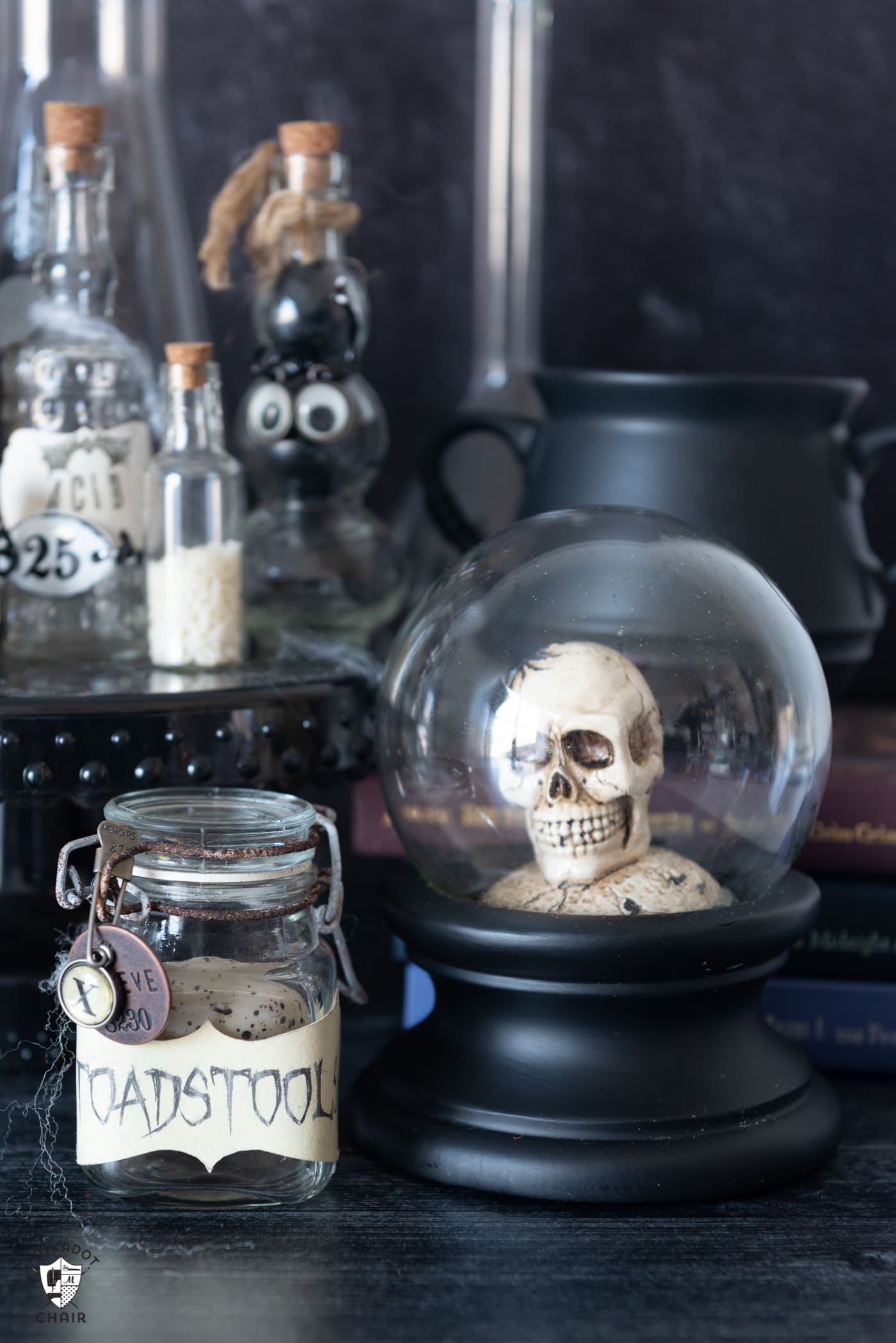 glass potions bottles on black table