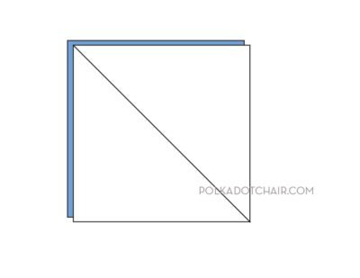 blue and white quilt block illustration; triangles and squares