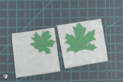 leaf shape, paper and fabric on cutting mat