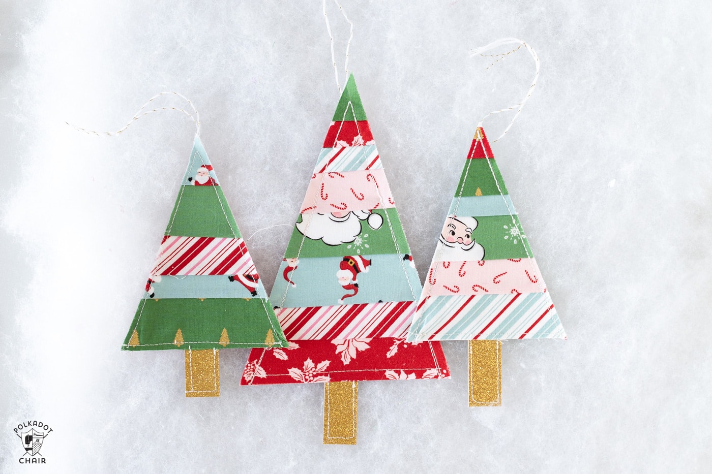 striped christmas tree ornaments on white table