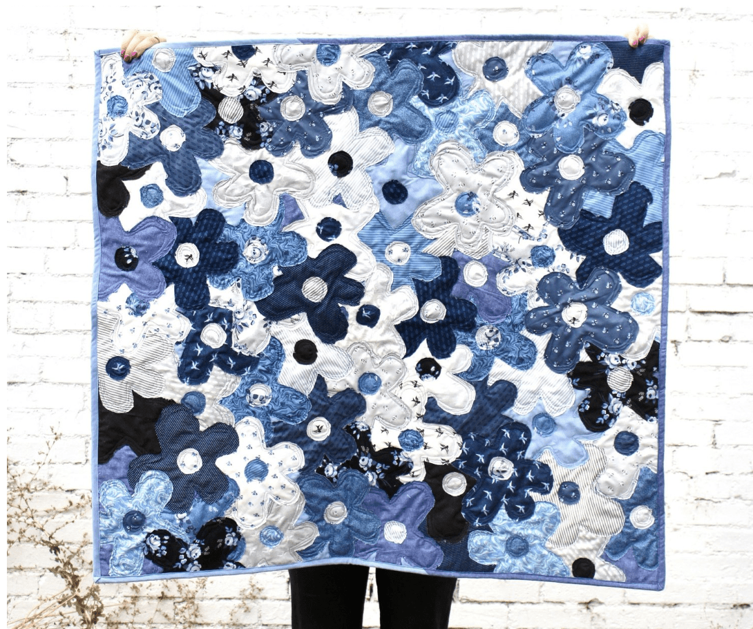 blue and white flower quilt