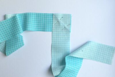 two blue fabric strips sewn together