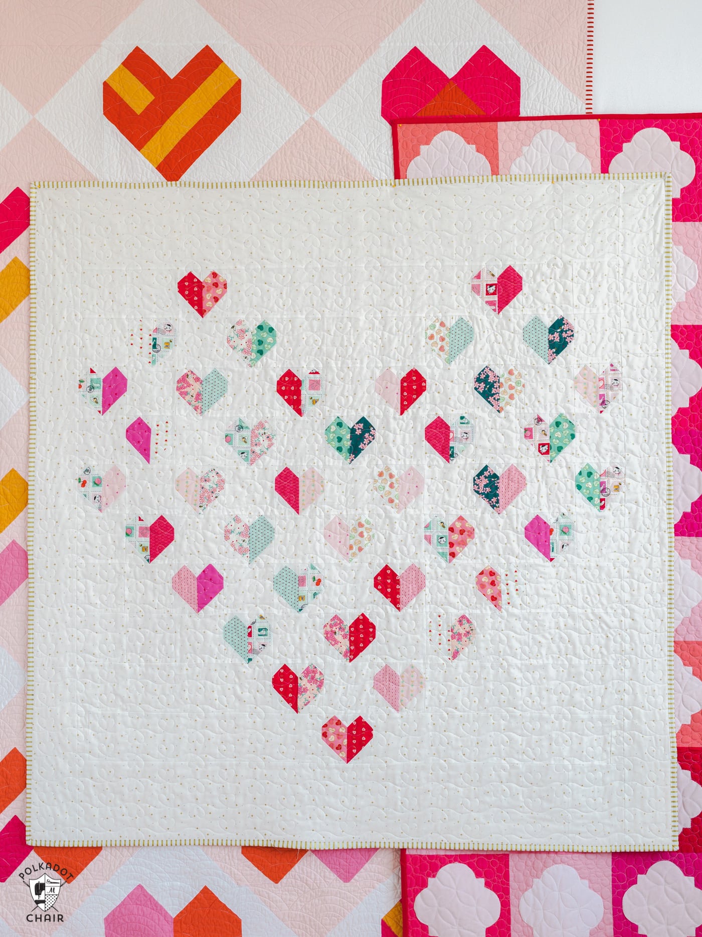 heart quilt hung on wall