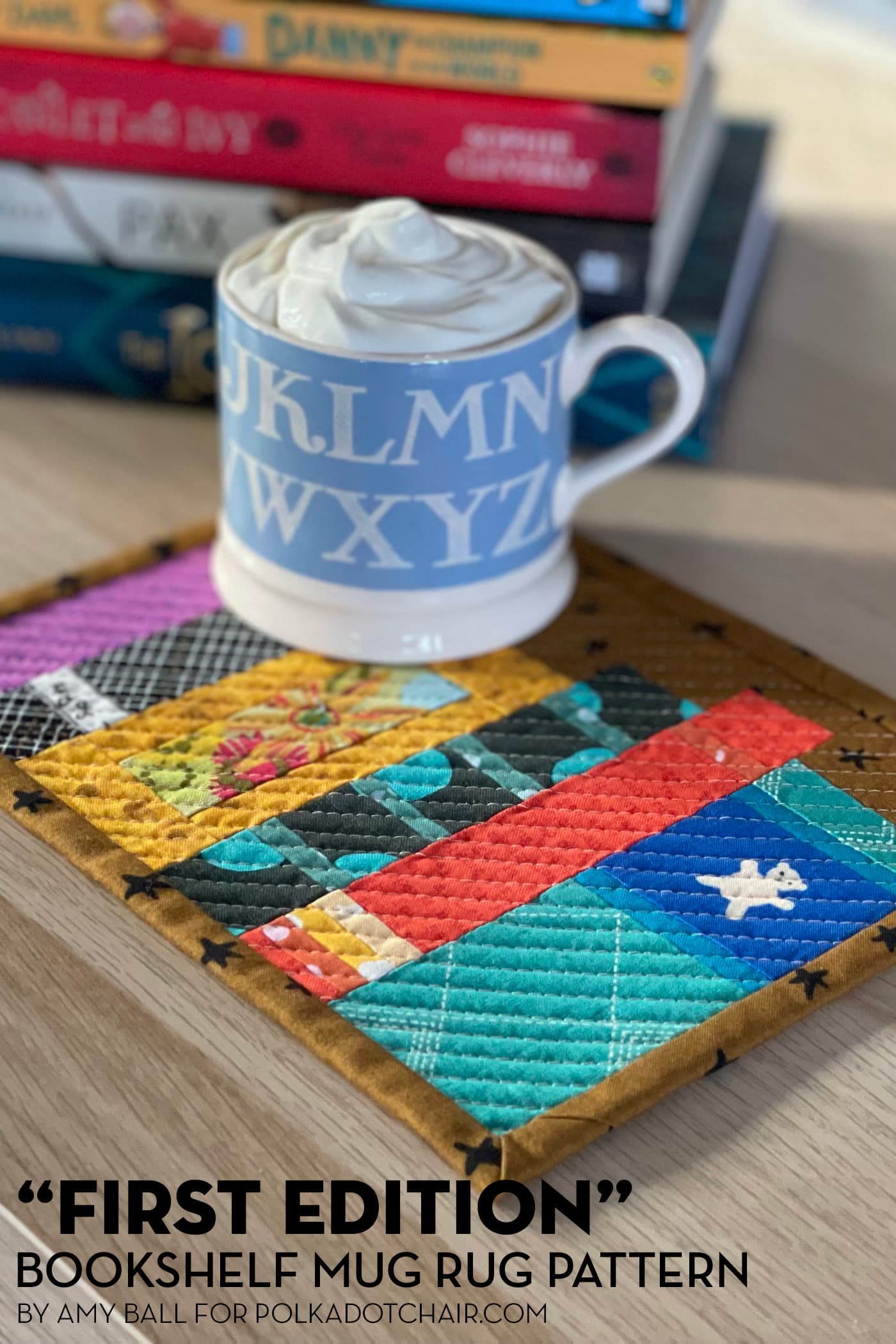 Mug rug and mug with ship cream and cocoa with books on wood table