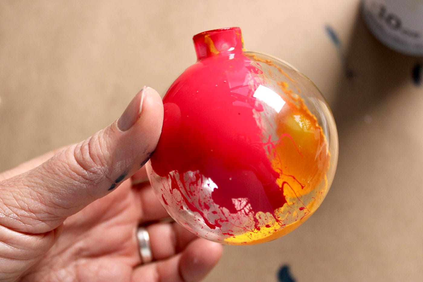 close up of paint inside of glass ornament