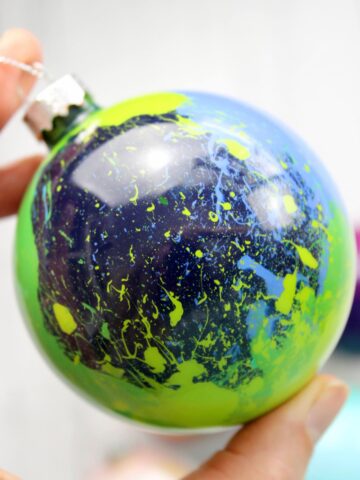close up of paint inside of glass ornament
