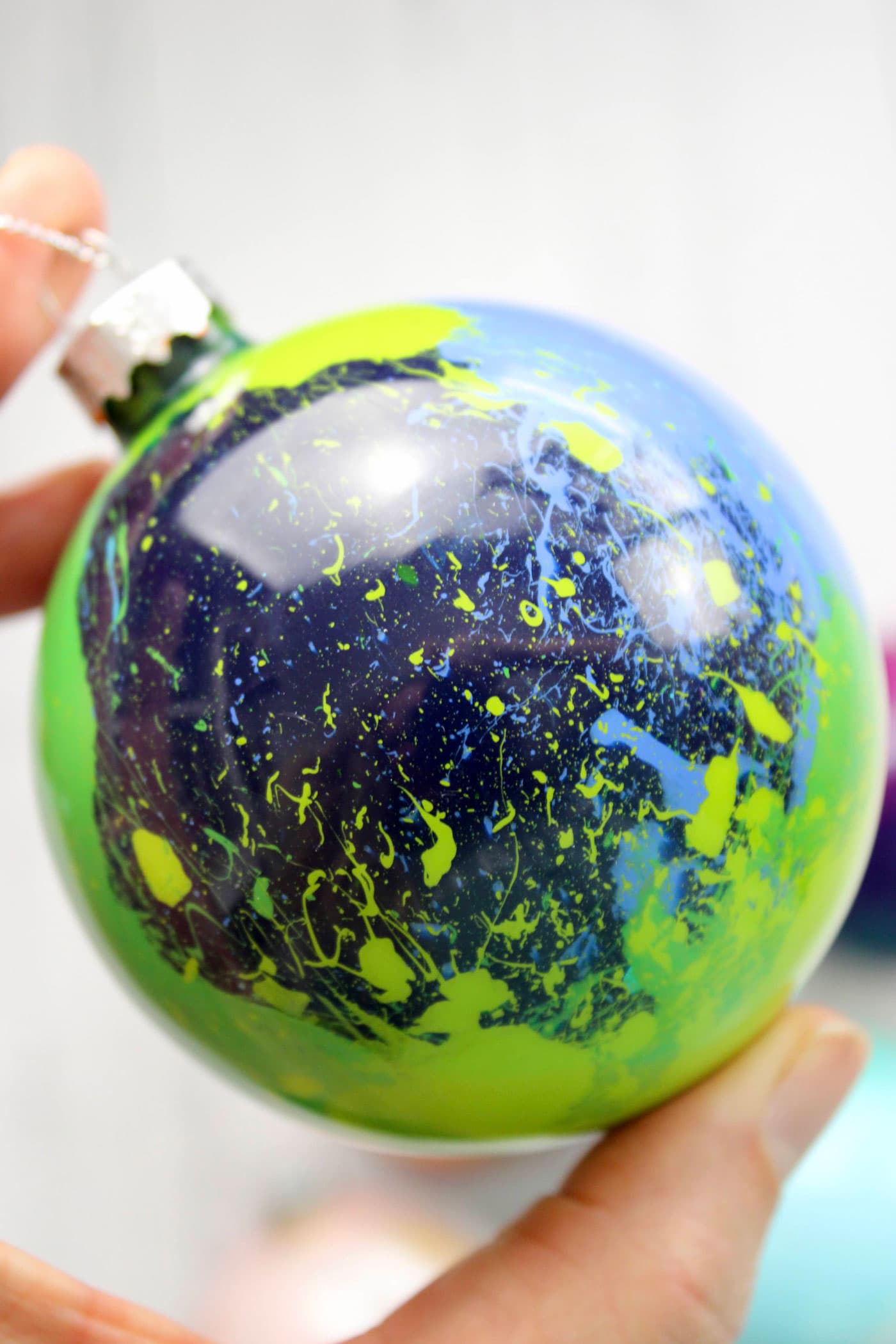 close up of paint inside of glass ornament