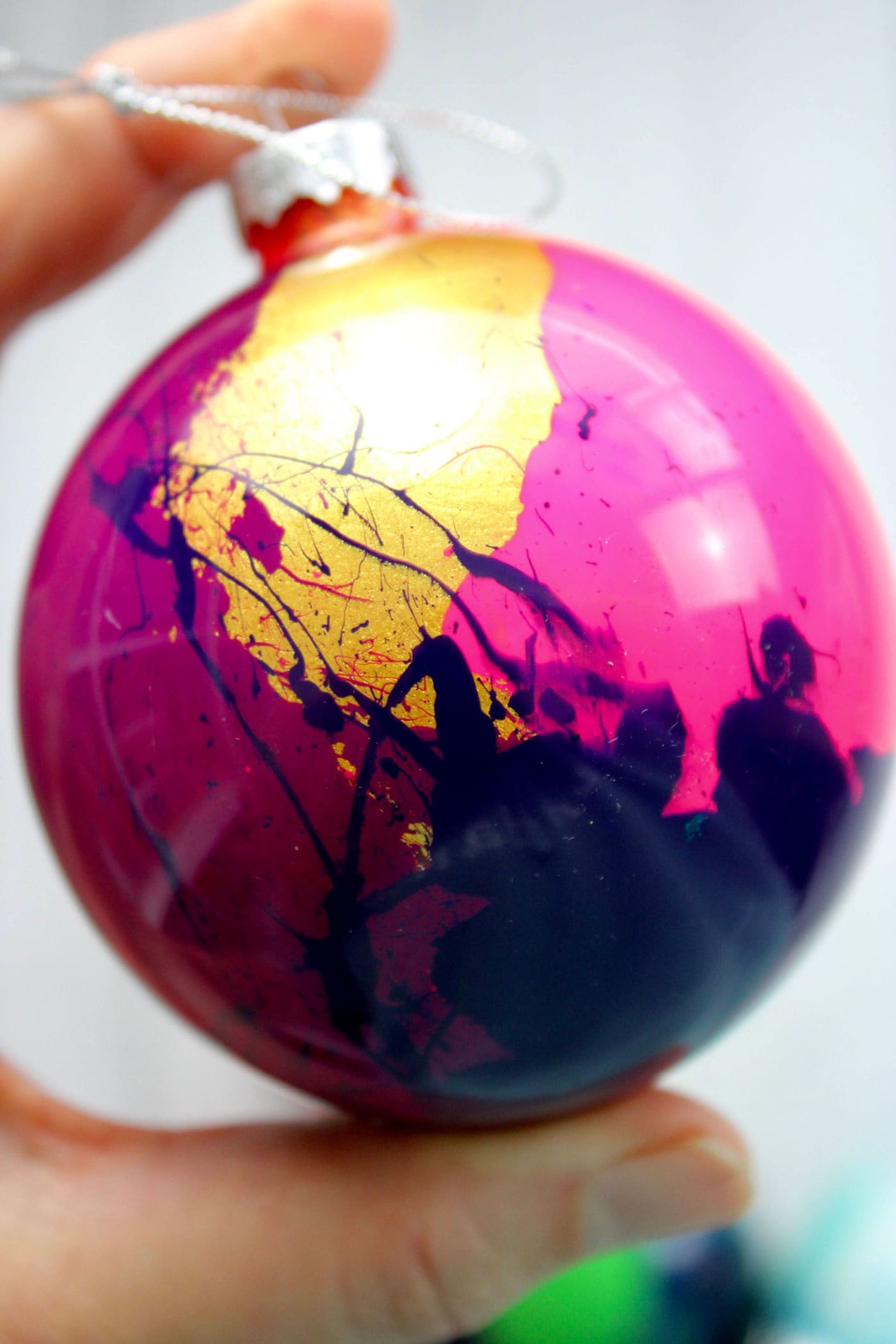 close up of paint inside of glass ornament